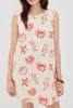 Woman wearing shell and crab print dress 