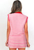 Woman wearing a pink and white striped dress on a white background