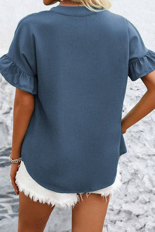 Back view of ruffle sleeve top