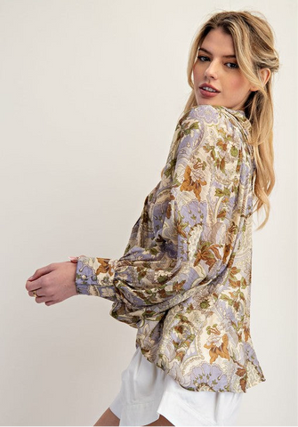 Side view of floral blouse 