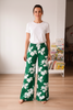 Green and white print wide leg pants