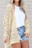 Side view of hollowed knit sweater 