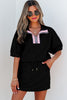 Close up view of black 2 piece skirt set
