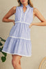 Close up view of blue and white dress 