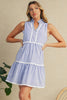 Front view of blue and white sleevless dress 