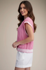 Side view of pink sleeveless cardigan