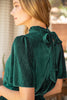 Green velvet holiday top. Back view.